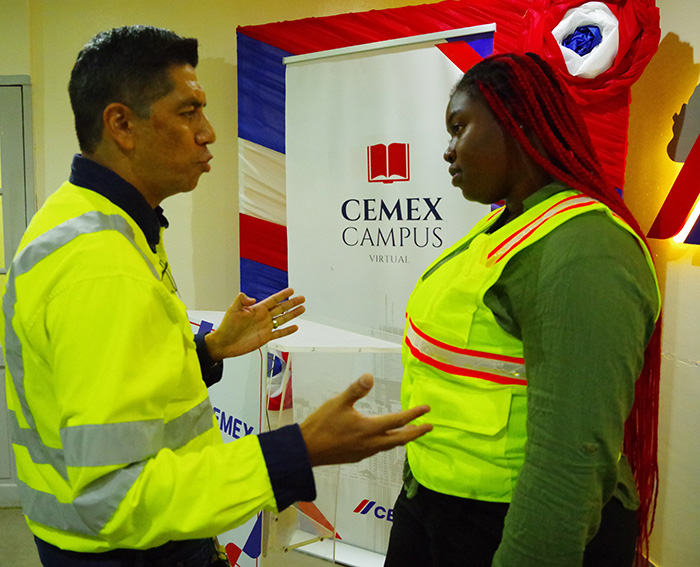 Managing Director of Caribbean Cement Company Limited, Mr. Jorge Martinez (left) engages in discussion with Shanna-Kay Green, a third-year Bachelor of Business Administration student at the University of Technology, Jamaica, during the virtual launch of Cemex Campus on September 22. Cemex Campus is a work-ready initiative designed to expose university students to the operations of a multinational company and the latest technologies in the cement industry